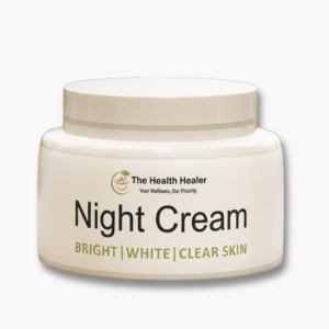 The Health Healer night cream on a cozy bedside table